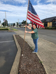 Dawn adding an Amercian Flag downtown
